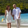 image of wedding couple walking on Cinnamon Bay, St. John